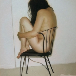 Figure on Chair